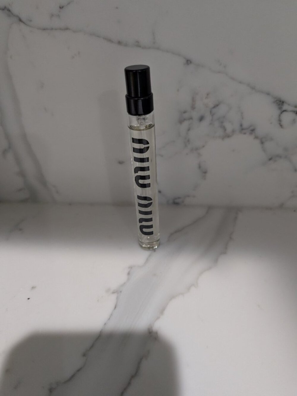 Miu Miu miutine discovery travel size